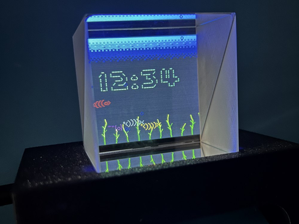 Acquario ASCII ESP32 con prisma